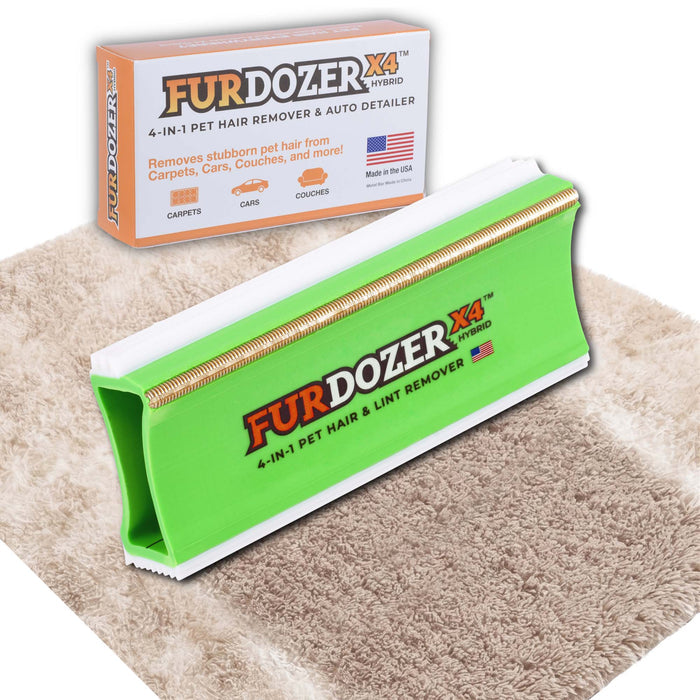FurDozer X4 Pet Hair Remover and Lint Remover tool shown in front of its retail box on a beige shag rug with a streak of clean carpet under the FurDozer. The FurDozer is a green color.